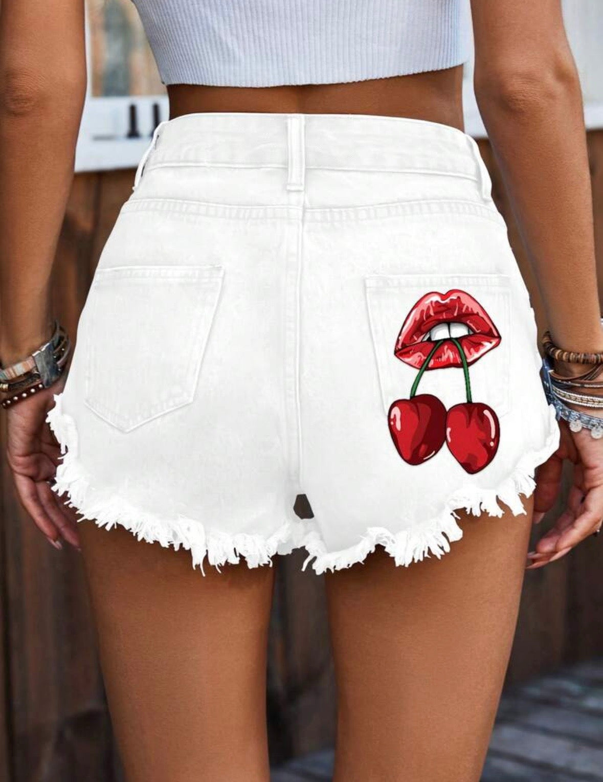 Short in Denim Distressed con Grafica Pop