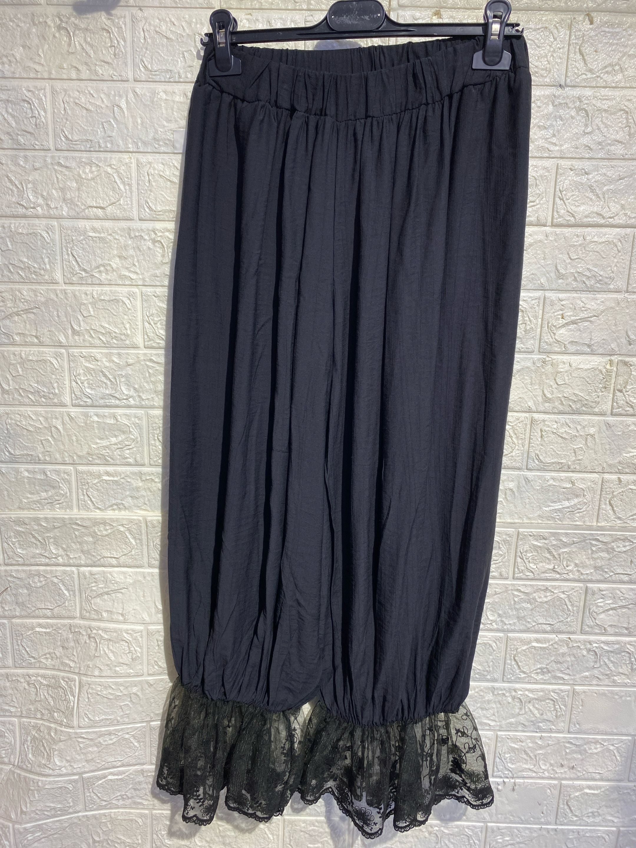 Pantaloni "Boho-Chic" a Gamba Larga con Dettaglio in Pizzo