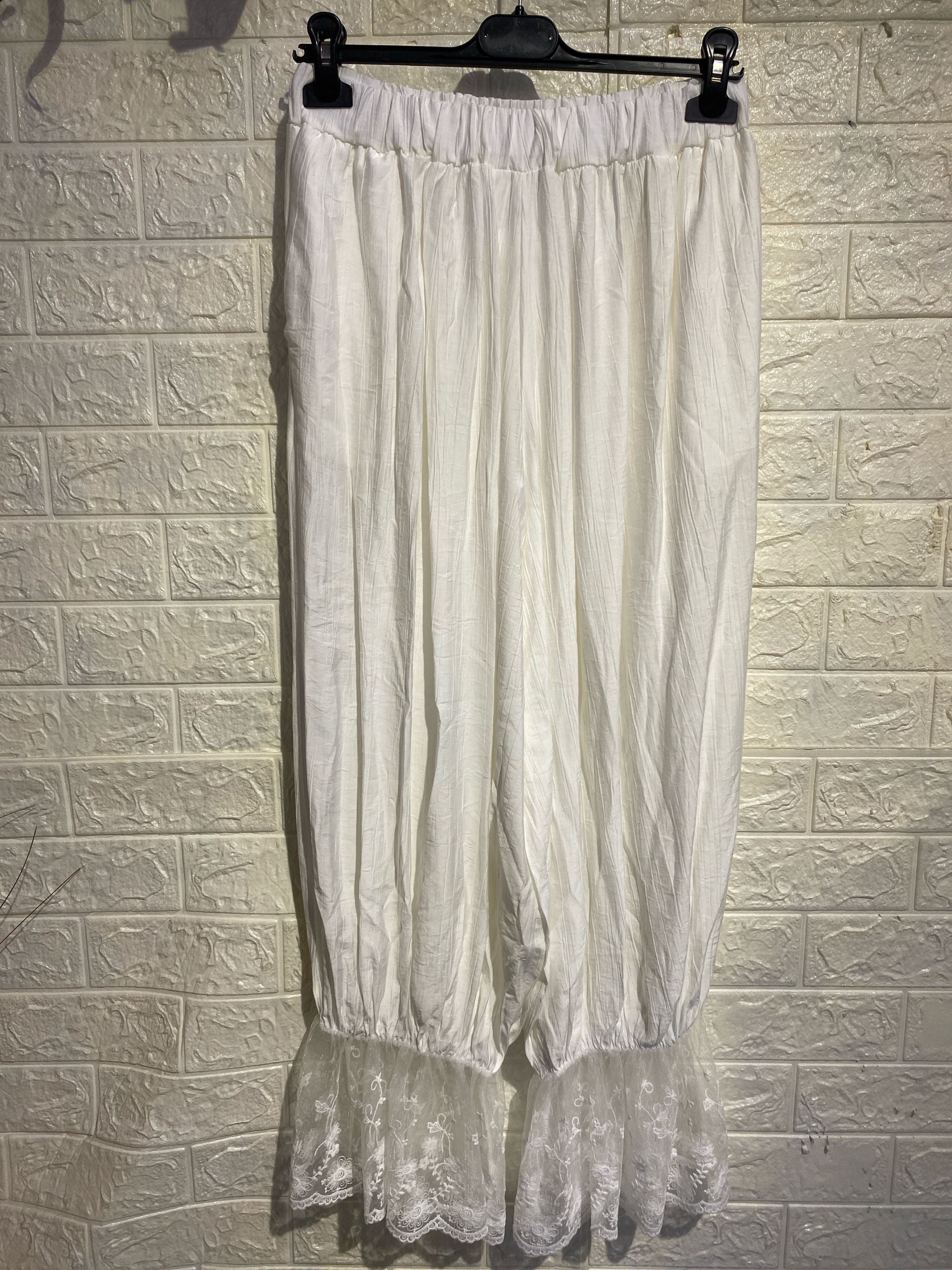 Pantaloni "Boho-Chic" a Gamba Larga con Dettaglio in Pizzo