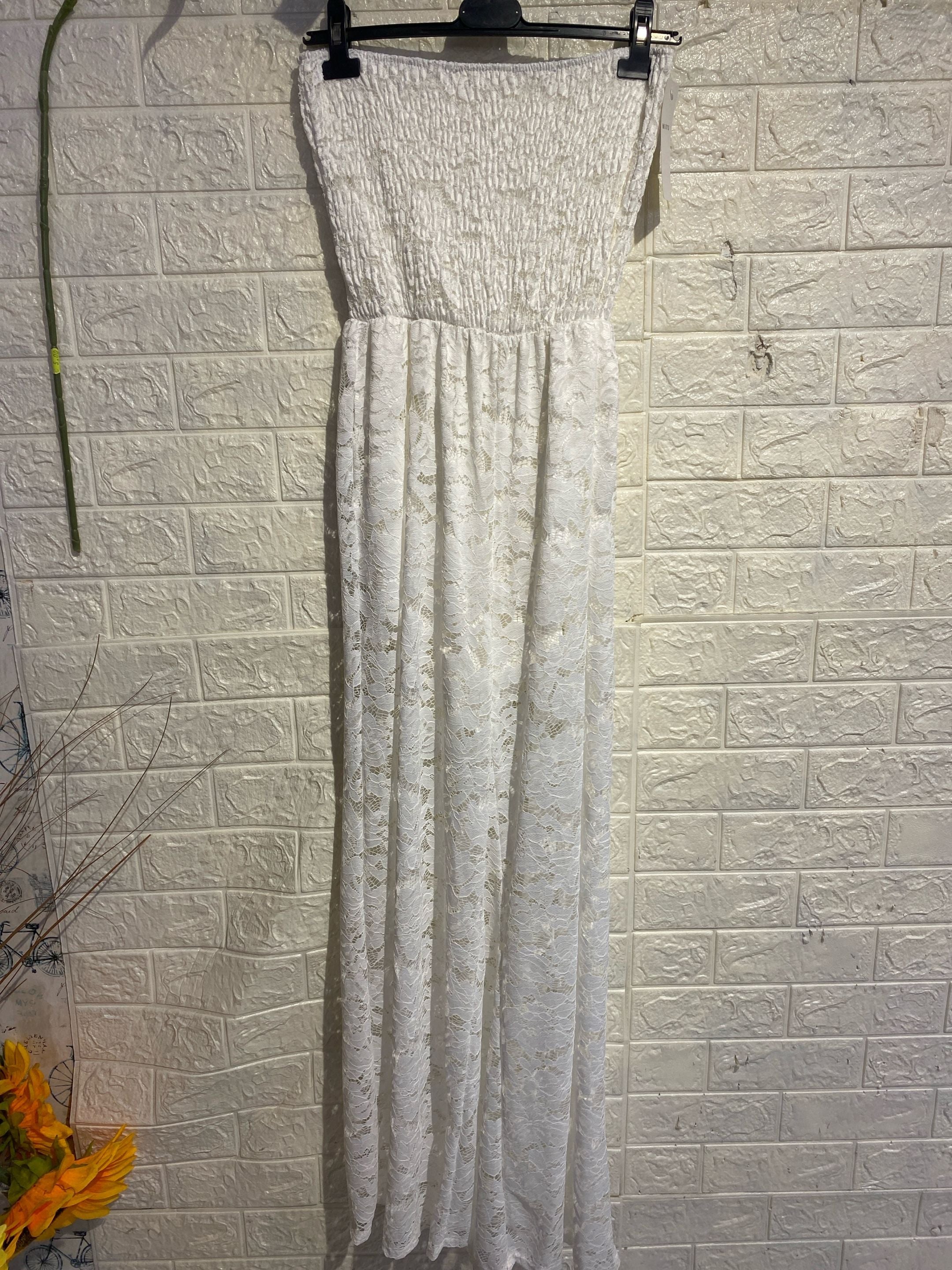 Tuta Intera Strapless in Pizzo – Eleganza e Sensualità